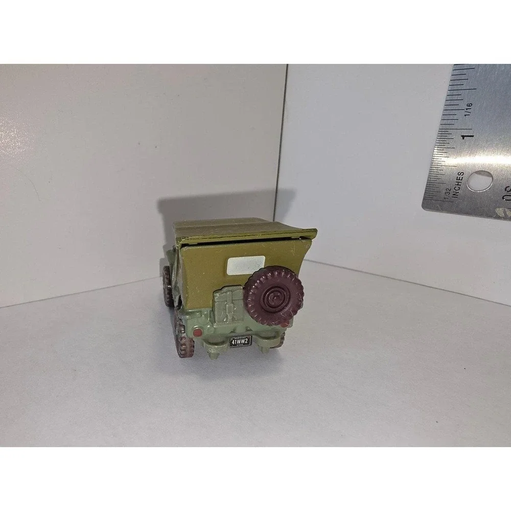 Disney/Pixar Cars Sarge diecast vehicle, specifically from the 1:55 scale Mattel